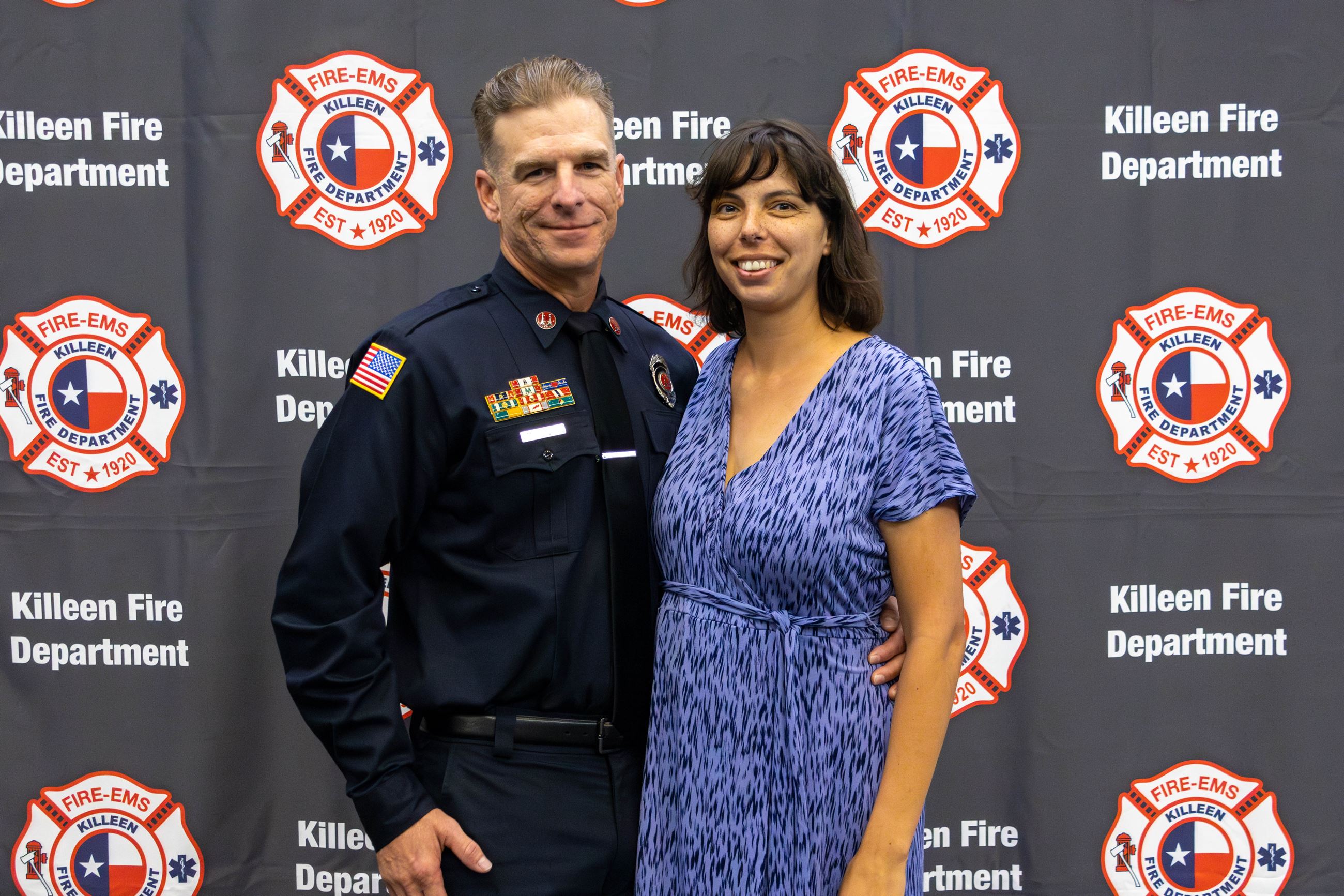 Captain Taylor with wife at a badge pinning ceremony on 11-12-24